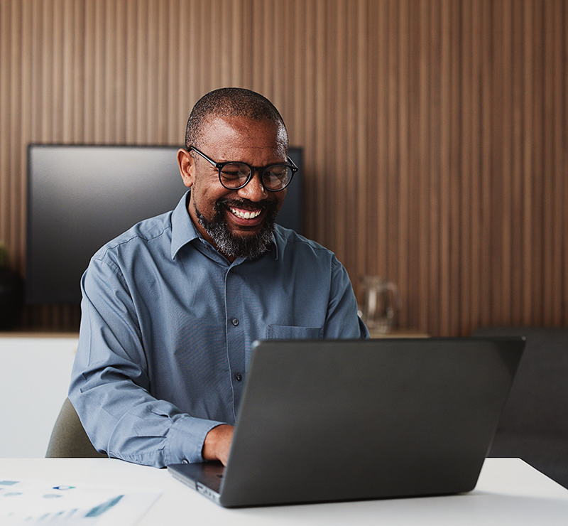 Scale LLP man working on Laptop